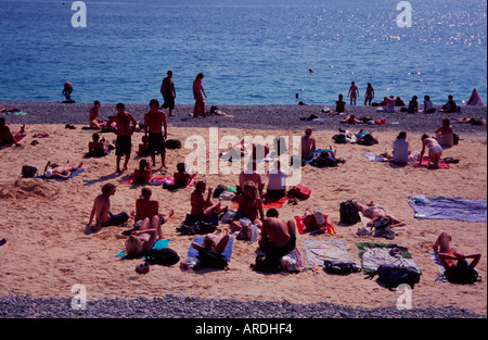 People sunbathing on an artificial beach, Nice, France Stock Photo