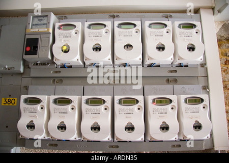 Twelve electricity meters on wall of apartment house Venice Italy Stock Photo