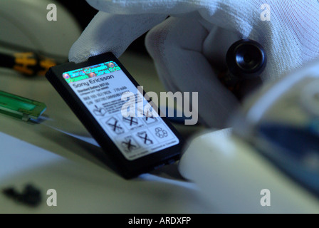 Mobile telephone testing and repairs Stock Photo