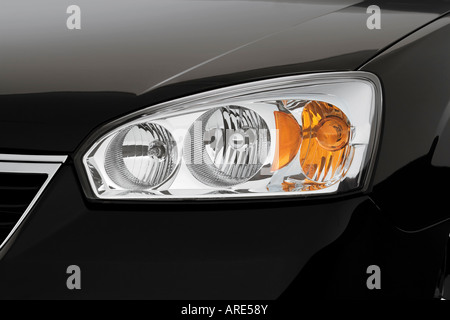 2005 Chevrolet Malibu Maxx LT in Black - Headlight Stock Photo