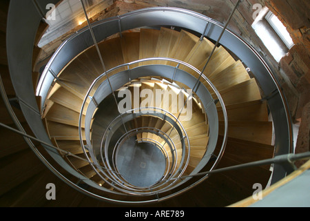 Looking down centre of spiral stairwell Stock Photo