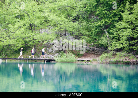 People Walking through Plitvice National Park Croatia Stock Photo