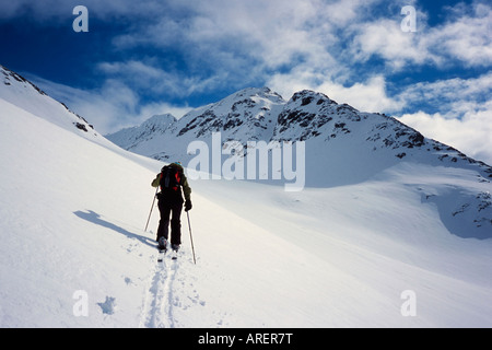 Telemark skier climbing the gentle slopes of Sofiatinden in the Lyngen Alps, arctic Norway Stock Photo