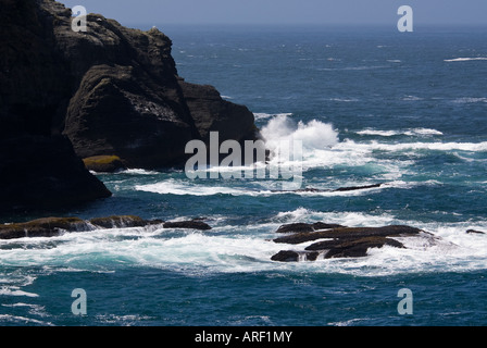 Waves crashing on rocks Stock Photo