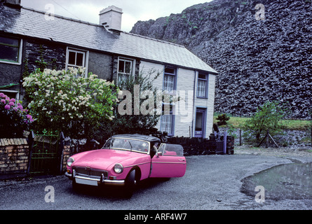 Very Pink Car and Slag Heap in Stock Photo