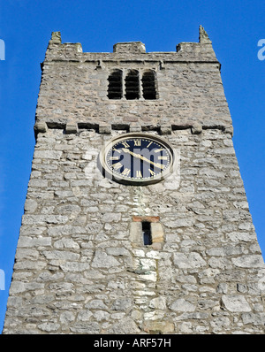 West tower and clock. Church of Saint Michael, Beetham, Cumbria, England, United Kingdom, Europe. Stock Photo