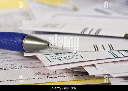 Personal finance letters pile of monthly bill bills household from above paperwork mail top view close up nobody none no one in USA Stock Photo