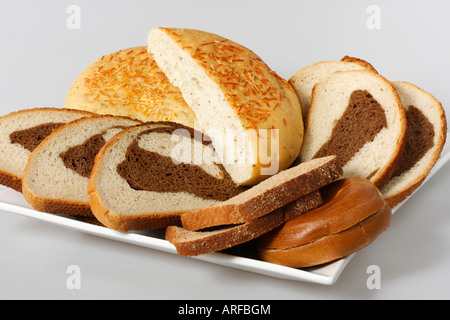 Closeup of American sliced a bread loaf basic food on a plate nobody from above food on white background isolated cut out cutout close up hi-res Stock Photo