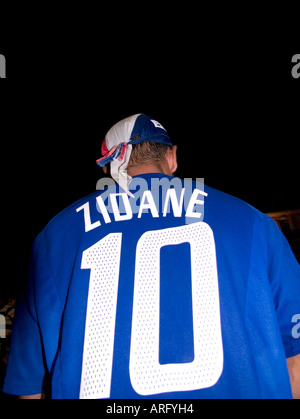 back of french male supporter wearing football shirt with  number ten and zidane on it Stock Photo