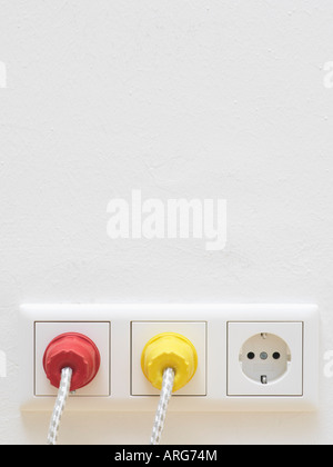 Plugs in Sockets Stock Photo