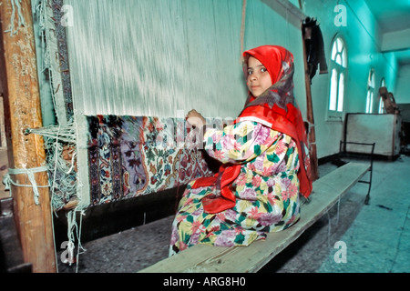 Egyptian Children Working 'Developing World' 'Saqqhrah Egypt' Arabian Female 'Child Labor' Working  Rug 'Carpet Factory' Stock Photo