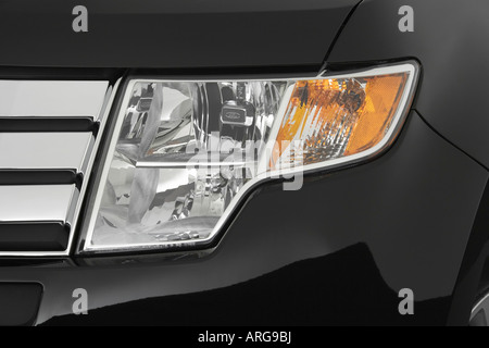 2007 Ford Edge SE in Black - Headlight Stock Photo