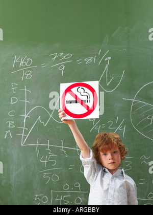 Boy Holding No Smoking Sign Stock Photo