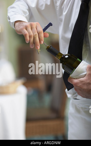 Waiter Opening Bottle of Wine
