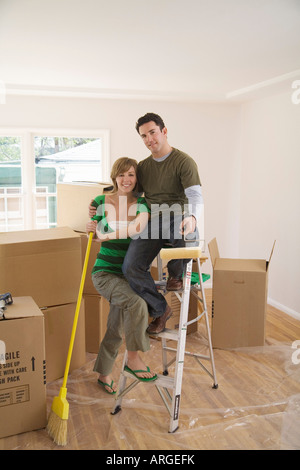 Couple Moving Into New Home Stock Photo