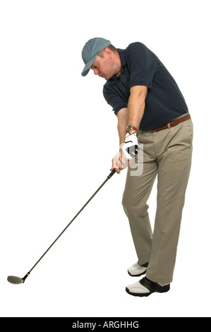 This golf image demonstrates a perfect example of keeping your head still and your eye on the ball when taking a shot Stock Photo