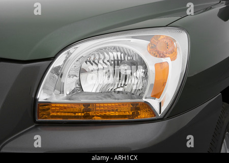 2007 Kia Sportage LX V6 in Green - Rear angle view Stock Photo