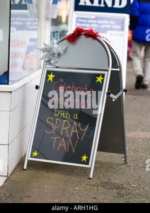 Sign outside UK tanning shop advertising a 'Spray Tans' Stock Photo