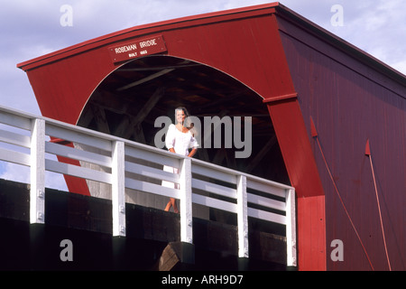 Beautiful Woman on Roseman Bridge in Madison County Iowa Stock Photo