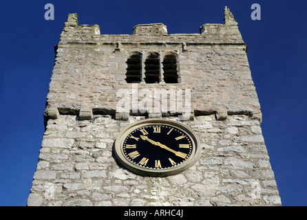 West tower and clock. Church of Saint Michael, Beetham, Cumbria, England, United Kingdom, Europe. Stock Photo
