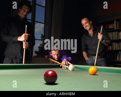 Men playing snooker Stock Photo