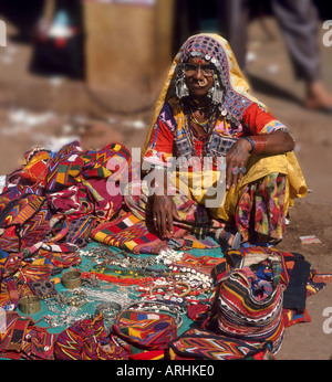 Jewellery and bag seller from Karnataka in the market at Mapusa, North Goa, Goa, India Stock Photo