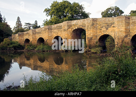 Old stone bridge over the river Arun at Stopham near Pulborough Sussex Stock Photo