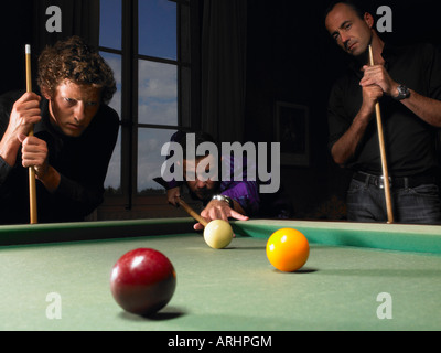 Men playing snooker Stock Photo