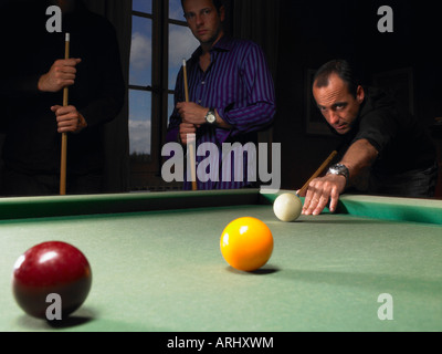 Men playing snooker Stock Photo