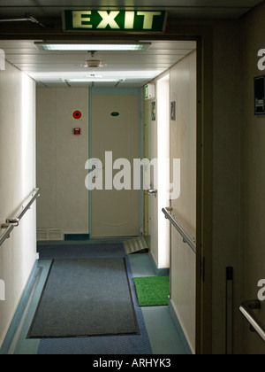 corridor for cabins with sign for emergency exit on the ferry Finnclipper of Finnlink Stock Photo