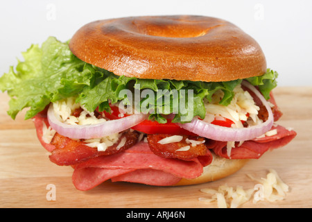 Bagel sandwich  on white background with vegetable and ham from front isolated cutout cut out nobody none no one presentation horizontal hi-res Stock Photo