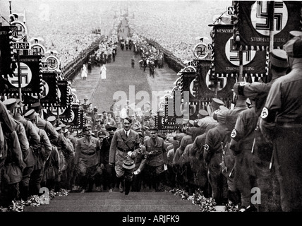 NUREMBERG RALLY 1938 Hitler mounts the steps to the podium from where he will make his speech Stock Photo