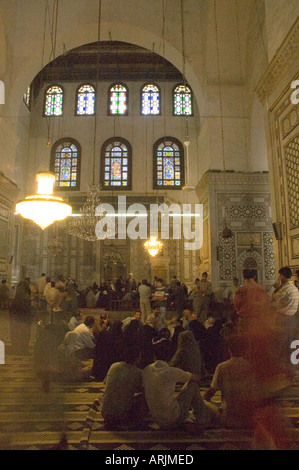 Pilgrims pray inside Umayyad Mosque, al-Hamidiyya souk, souq, district of Damascus, Syria, Middle East. DSC 5615 Stock Photo
