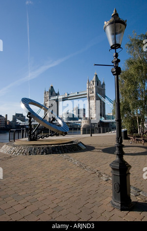 Sundial and Tower Bridge from St Katherine s Dock London England UK Stock Photo