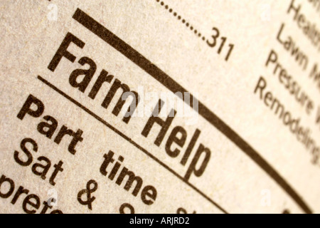 farm help ad in daily newspaper Stock Photo