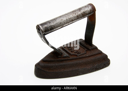 An old Victorian antique domestic smoothing iron. Stock Photo