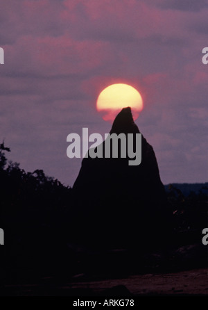 Sun setting behind the Winter Solstice Stone on the perimeter of Mystery Hill North Salem New Hampshire USA Stock Photo
