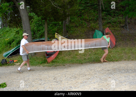 husband and wife Canoeing on the Au Sable River at the Rifle River Recreational Area near Mio Michigan MI Stock Photo