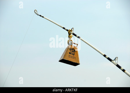 https://l450v.alamy.com/450v/arktkf/bell-on-the-end-of-a-fishing-pole-alerts-the-fisherman-of-a-strike-arktkf.jpg