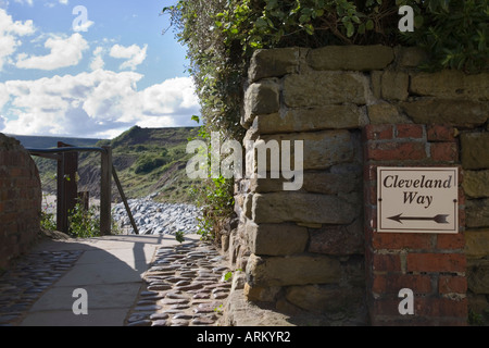 Cleveland Way Long Distance Footpath sign and path to beach 'Robin Hood's Bay' Yorkshire England Stock Photo