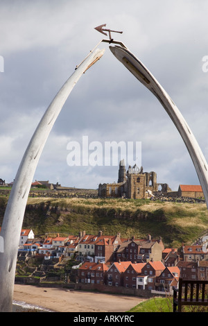 [St Mary church] [St Hilda Abbey] on 'East Cliff' old town quayside buildings River Esk framed by whale bone arch on 'West Clif Stock Photo