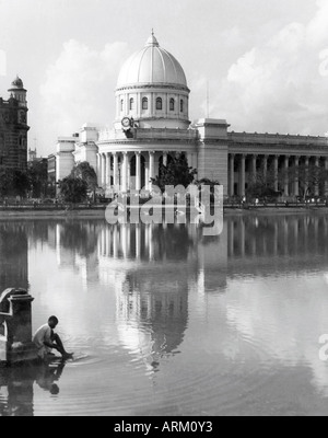 VRB101382 Reflection of General Post Office building in pond Calcutta West Bengal India 1940s Stock Photo