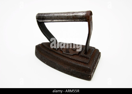 An old Victorian antique domestic smoothing iron. Stock Photo