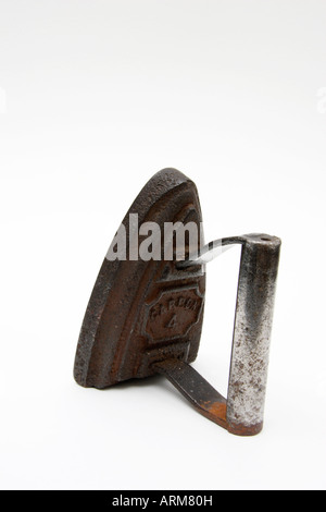 An old Victorian antique domestic smoothing iron. Stock Photo