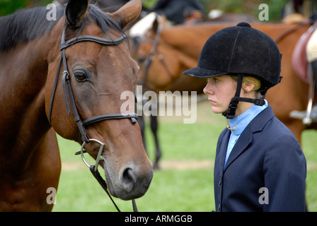 High school female student competes in equestrian event Stock Photo