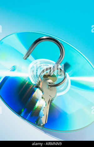 Photo Composite of CD with Padlock and Key Stock Photo