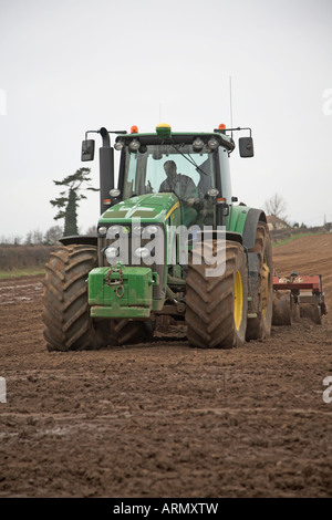 John Deere tractor harrowing a field in Perthshire Stock Photo - Alamy