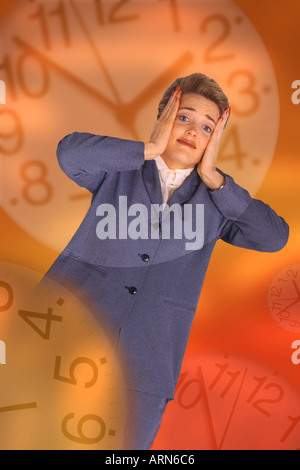 Businesswoman clock faces Stock Photo