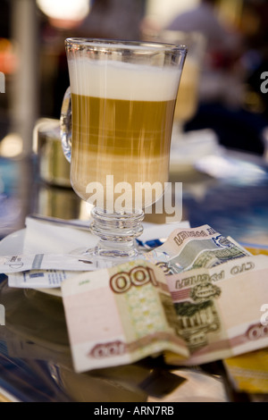 Latte Coffee and Roubles Moscow Russia Eastern Europe Stock Photo