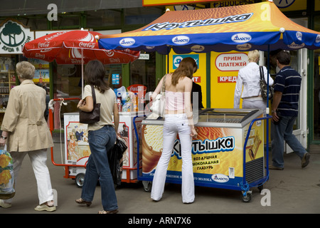 Girl selecting ice cream from market stall in street Moscow Russia Eastern Europe Stock Photo